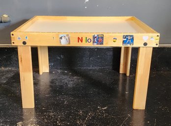 NILO TOYS TODDLER ACTIVITY TABLE WITH HOLES IN FRAME