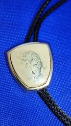 VINTAGE SILVER TONE AND LEATHER BOLO TIE