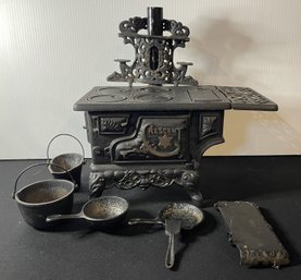 ANTIQUE CRESCENT MINIATURE CAST IRON STOVE