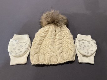 TAN KNITTED POM POM BEANIE AND A PAIR OF WHITE HEARTED CONVERTIBLE MITTENS