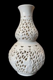 A CHINESE BLANC DE CHINE RETICULATED PORCELAIN VASE