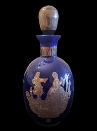 BEAUTIFUL COBALT BLUE ART GLASS DECANTER WITH GOLD TONE GALANT COUPLE DESIGN