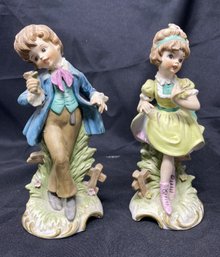 PR OF BISQUE PORCELAIN BOY AND GIRL FIGURINES