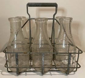 VINTAGE MILK GLASS BOTTLES AND METAL CARRIER