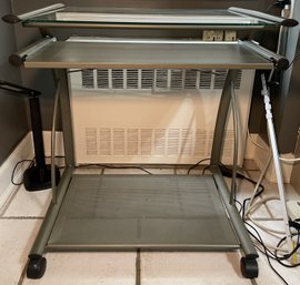 MODERN GLASS TOP COMPUTER DESK WITH CASTERS