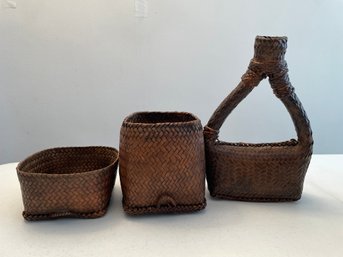 SET OF THREE WICKER RATTAN TRINKET BASKETS