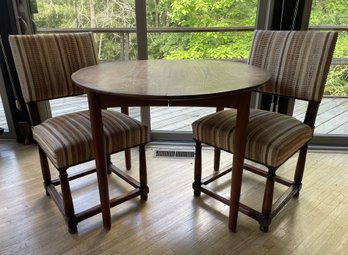 MCM EXTENDABLE WALNUT RACETRACK OVAL DINING TABLE AND PR OF UPHOLSTERED CHAIRS