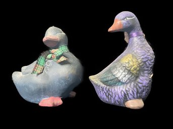 PAIR OF ELEGANT LOOKING BLUE AND PURPLE DUCK FIGURINES WITH NECK RIBBON