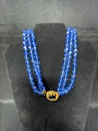 VINTAGE DE MARIO THREE STRAND FACETED BEADED NECKLACE WITH BLUE CENTER STONE
