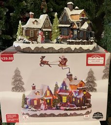 HOLIDAY LIVING FLYING SANTA VILLAGE SCENE LIGHTED MUSICAL