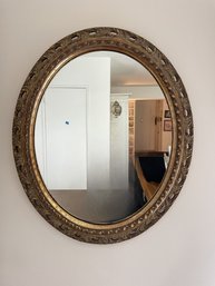 HAND CARVED OVAL GOLD GILT MIRROR