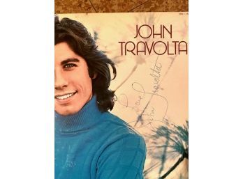 COLLECTION OF JOHN TRAVOLTA AUTOGRAPHED MEMORABLIA