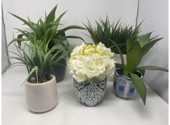 COLLECTION OF DECORATIVE ARTIFICIAL PLANTS AND VASES