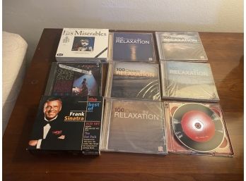 COLLECTION OF ASSORTED CDS AND DVDS