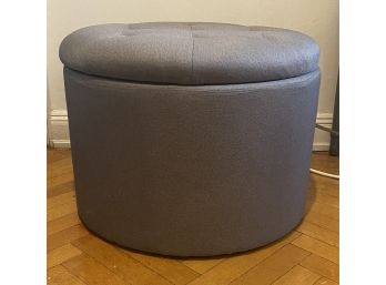 ROUND GRAY TUFTED STORAGE OTTOMAN