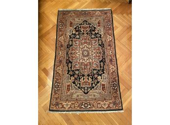 SAFAVIEH AREA RUG WITH NAVY BORDER