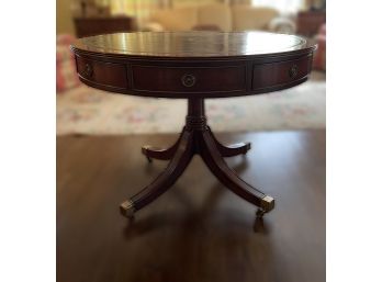 VINTAGE STICKLEY INLAID LEATHER AND MAHOGANY DRUM TABLE WITH BRASS HARDWARE