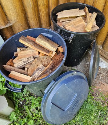 R00 Three Rubbermaid Bins Full Of Firewood And Additional Stack Of Firewood