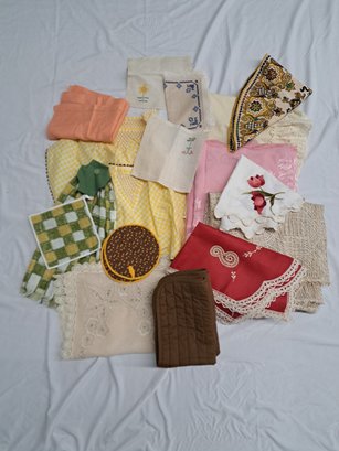 Assortment Of Linens Including, Table Cloths, Napkins, Handkerchiefs, Pot Holders, Placemats And Apron.