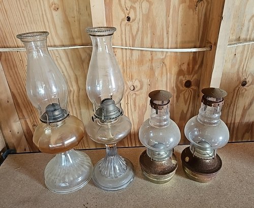 R0 Lot To Include Four Glass Oil Lamps