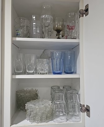 R10 Three Shelves Full Of Glassware