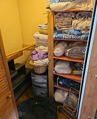R9 All Contents In Small Closet To Include Full/Queen And Twin Size Sheets, Small Luggage Cart, And Shelf