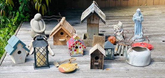 R00 Collection Of Birdhouses, Wind Chimes, And Garden Art