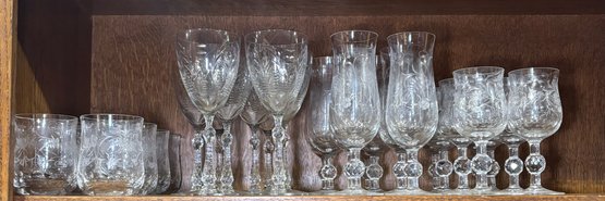Etched Style Glassware Collection To Include Glasses, Champagne Flutes, Wine Glasses, And Others