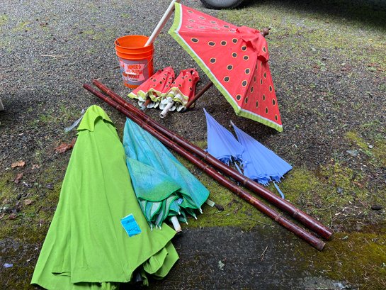R0 Outdoor Umbrellas, Two Lengths Of Stained Bamboo, 5 Gallon Bucket