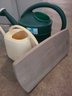 Gardening Tools, Gloves, Water Cans, Potting Soil, Plastic Stool, Shovels And Hose.