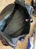Small Cooler, Duffel Bag, Umbrellas, Plastic Bags