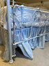 R12 Antique Iron Childs Bed With Adjustable Side And Vintage Quilt. All Bedding Included.   40in At Tallest