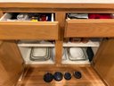 R3 Two Kitchen Drawers And Lower Cabinet Contents.  Hotpads, Batteries, Flashlights, Candles, Plastic Food