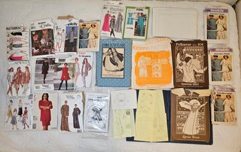 R7 Collection Of Vintage Sewing Patterns Including Brands Such As Vogue, DNKY, Folkwear, And Simplicity