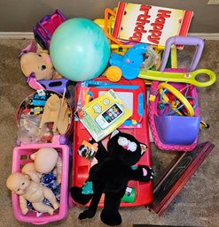 R7 Children's Toy Lot To Include Barbie Car, Cat Puppet, Chalk Board, Baby Dolls, And More Kid's Toys