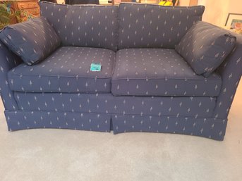Loveseat With Two Matching Pillows.