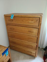 Wooden Dresser And Women's Sweaters