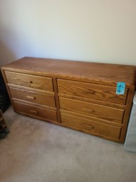 Wooden Dresser And Women's Sweaters