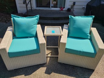 Wicker Chairs With Cushions And Small Table With Glass Top. Chairs Measures About 31in X32in X32in And The Tab