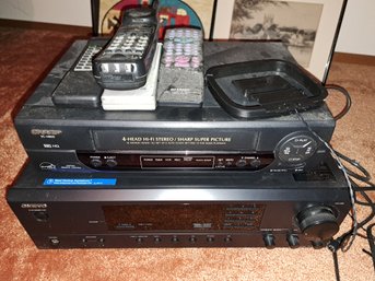 Onkyo Stereo Receiver, Antenna, VHS Player, Panasonic Phone And Remotes