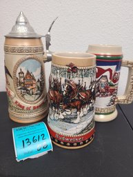 3 Budweiser Beer Steins Various Sizes. Two Of Them Have Certificate Of Authenticity.
