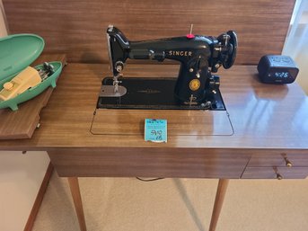 Vintage Singer Sewing Machine With Table Measuring 43in X18in X31in. Singer Accessory And Capello Alarm Clock