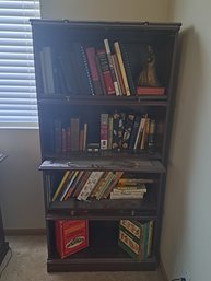 Bookshelf With Sliding Doors, With Books To Include Bibles, Children's Books And Walt Disney Book Sets.