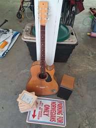 Guitar, Amp, Photo Frames And Parking Sign.