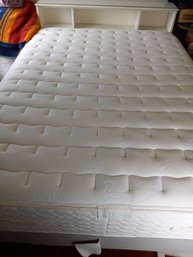 A Queen Size Bed With A Mattress, Box Spring And Headboard