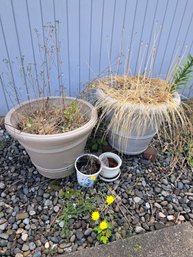 Two Large Outdoor Pots And Two Small Pots