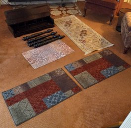 Dissassembled Desk With Four Rugs