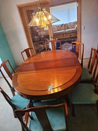 Solid Wood Asian Inspired Dining Table And Chairs.