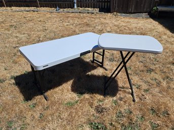 Two Plastic Folding Tables