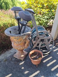 Garden Hose Reel And Hose, Small Outdoor Pot And Large Outdoor Pot With Solar Lights.